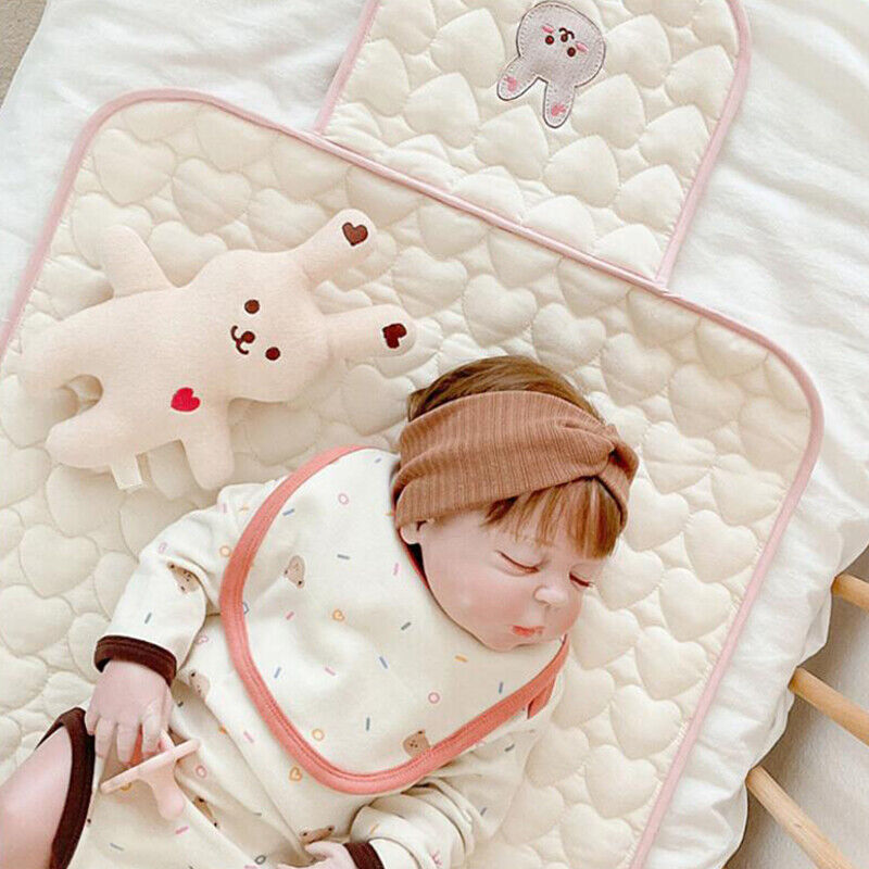 tapis-a-langer-bebe-dort